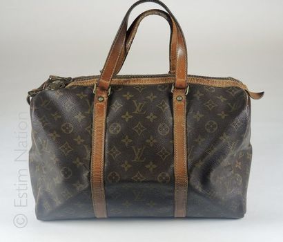 LOUIS VUITTON circa 1975 SAC ''KEEPALL'' en toile Monogram et cuir naturel, cadenas,...