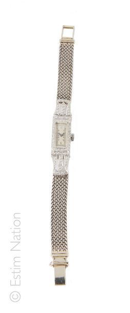 MONTRE DE DAME PLATINE DIAMANTS Bracelet montre de dame en or gris 18K (750/°°) et...