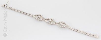 Bracelet diamants Bracelet en or gris 18K (750/°°) à maille tressée, rehaussé de...