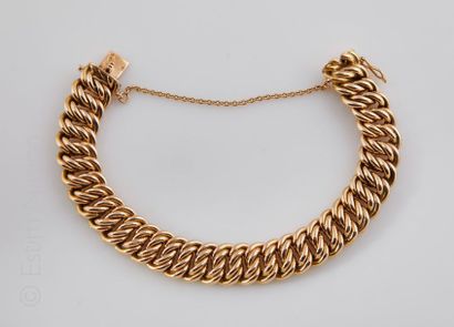 Bracelet gourmette Bracelet gourmette maille américaine en or jaune 18K (750°/00)...