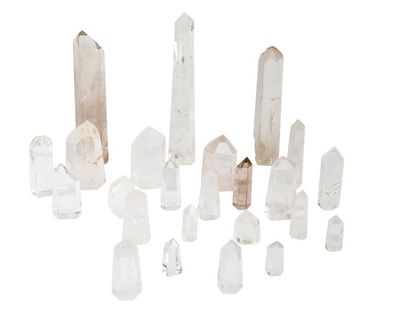 null Ensemble de cristaux de roche taillés en obélisque

H. de 4 à 28 cm