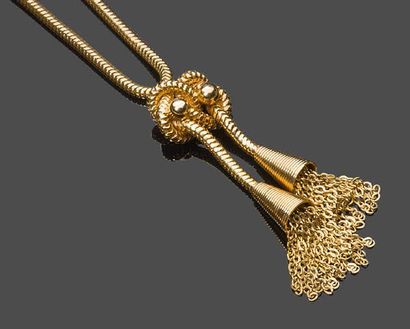 null Collier en or jaune 750/°° en maille turbogaz terminée par deux pompons
Poinçon...