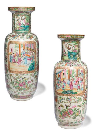 null Pair of porcelain and enamel roller-shaped vases in the "pink family style"....