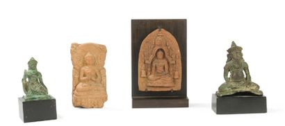 null Set of two votive terracotta stelae and two bronze
amulets South East Asian...