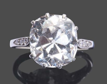 null White gold and platinum ring set with a large old cushion-cut diamond weighing...