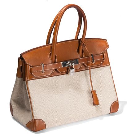 HERMES Birkin. 30 cm
Handbag in natural "Barenia" calfskin, beige "H" canvas.
Palladium...