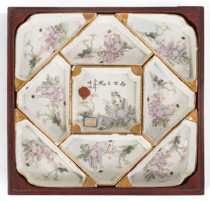 null Box containing nine porcelain and enamel bowls in pink family style, decorated...