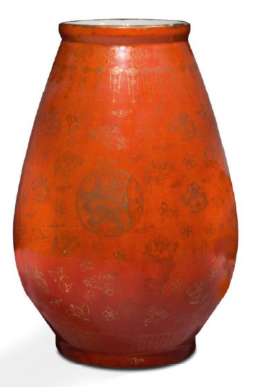 null Vase of oblong shape in porcelain and coral enamel, with gold decoration of...