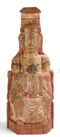 null Large wooden subject, formerly lacquered, decorated with seated divinity.
Vietnam,...