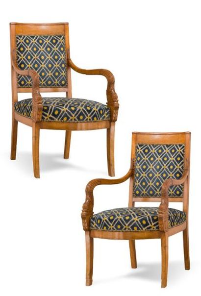 null Pair of carved, moulded and patinated mahogany armchairs with dolphin heads...