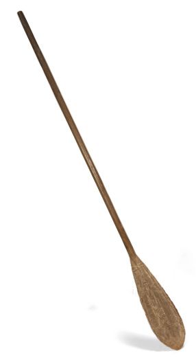 null Paddle with a blade decorated with sinuous patterns enhanced with kaolin.
Dark
patinated...