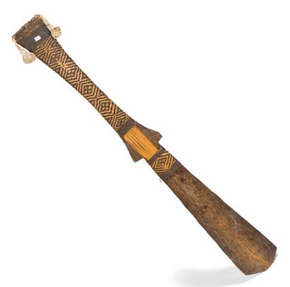 Wooden club of flared shape with a handle...