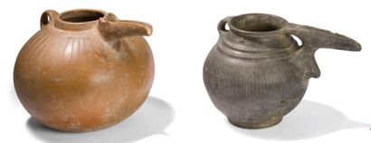null Set of two terracotta rithons with incised geometric decoration.
2nd millennium...