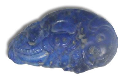 null Lapis lazuli subject with stylized fish decoration.
China, Qing
dynasty L. 6.8...