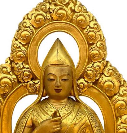null Statue de Tsomgkapa en bronze doré représenté assis, les jambes croisées sur...