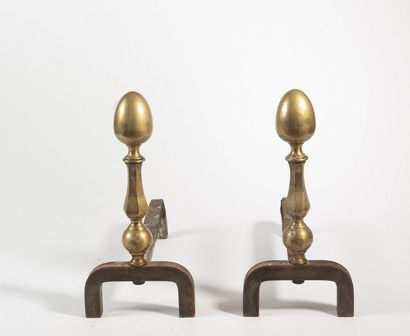 null Pair of golden brass andirons.
XIXth century
H. 33 cm
