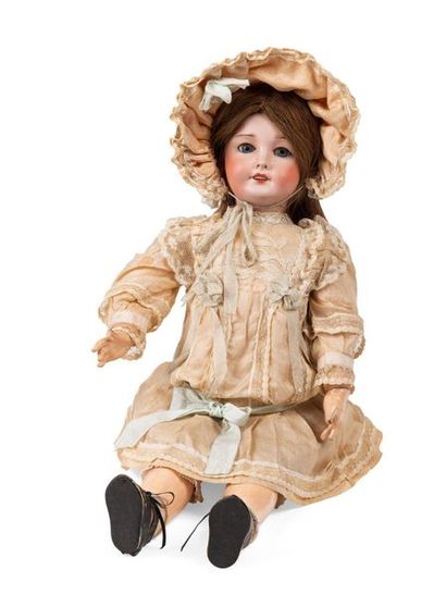 null SFBJ French doll, head in cast biscuit marked 9, the body in papier-mâché. Original...