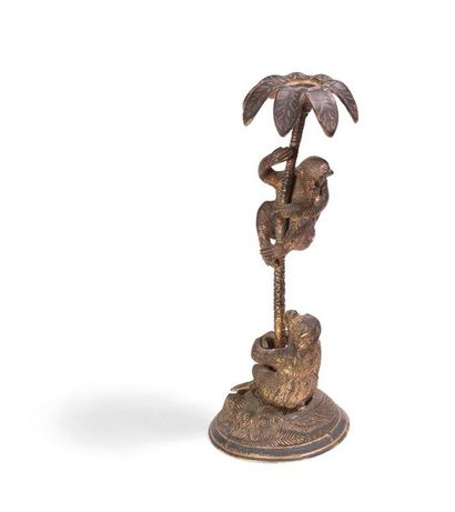 null Copper alloy set depicting monkeys, two of them climbing along a candlestick...