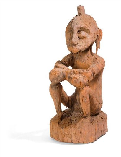 null Sitting male character. Wood very eroded by the bad weather 

Style of funerary...