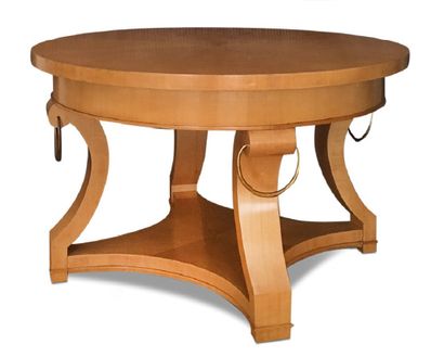 - André ARBUS (1903 - 1969) 
Circular neo-classical coffee table in sycamore and...