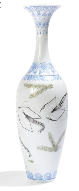 A tapering vase with a long neck and flared...