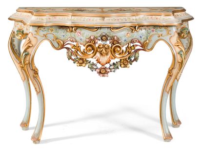  Carved, lacquered and gilded wooden console opening by a drawer in the belt, with...