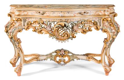  Carved, lacquered and gilded wooden console opening by two drawers in belt, with...