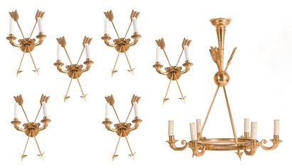 Suite of five two-light sconces in chased...