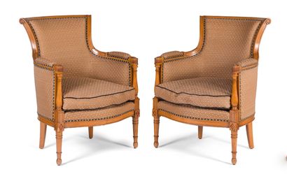 Pair of armchairs with upside down back in...