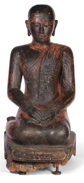 null Large subject in black and red lacquered wood, depicting a monk kneeling, his...