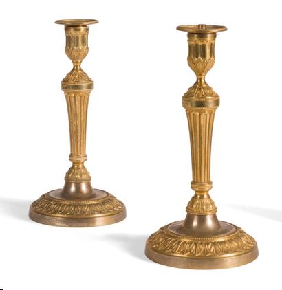 Pair of chased and gilt bronze torches with...