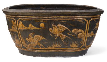  Large glazed stoneware basin with gold decoration of birds in landscapes on a black...