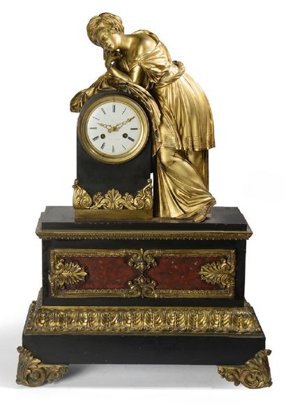 null Clock in chiselled and gilt bronze, black and red Morello cherry marble, with...