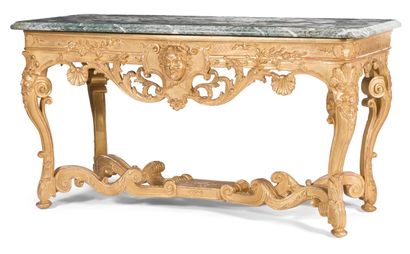 null Carved, moulded and gilded wooden console with Indian profiles, shells and foliage...