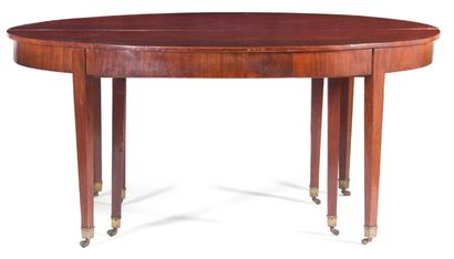 null Oval dining table in mahogany and mahogany veneer. Wrapped base finished with...