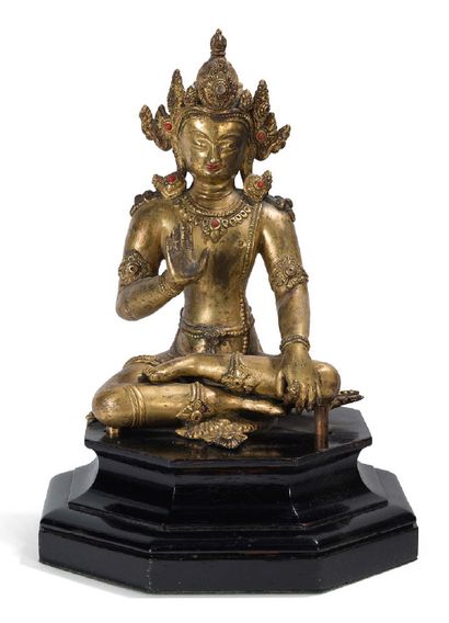 null Statuette en bronze doré, représentant un boddhisattva assis en méditation,...
