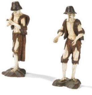 null Deux personnages, un homme et une femme, en bois de tilleul et os sculptés.

Allemagne...