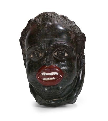 null Elément décoratif à décor de tête d africain.
Le visage en agate verte, le bouche,...