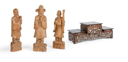 null Three huali wood statues, representing three stars with a rosewood display stand...