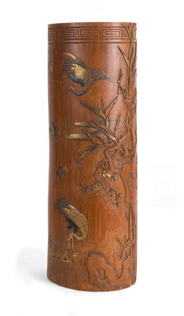 null A large bamboo brush holder with carved decoration in light relief and enhanced...