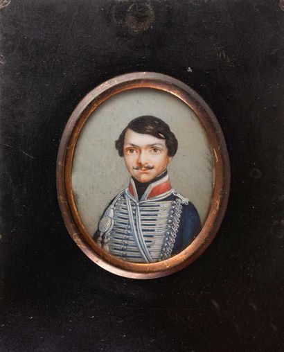 Ecole française, première moitié du XIXème siècle. Portrait d'un jeune homme au chapeau...
