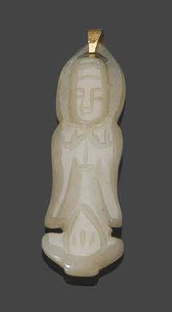 null Petite statuette sculptée en jade blanc, représentant une divinité asiatique.
La...