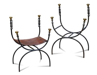 null Pair of patinated steel armchairs with curved legs and turned brass decorative...