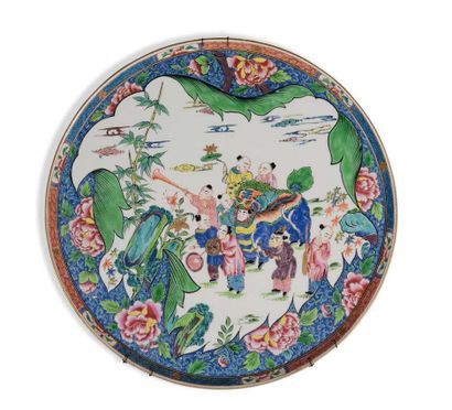 null Large round porcelain dish with polychrome and gold enamel on a white background,...