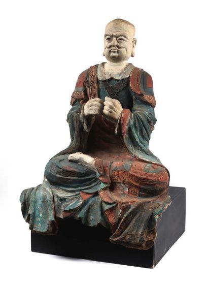 Important polychrome adobe statue, representing...