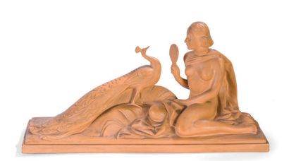 R. POLLIN XXème siècle Femme au paon
Sculpture en terre cuite patinée. (Petits accidents)
H...