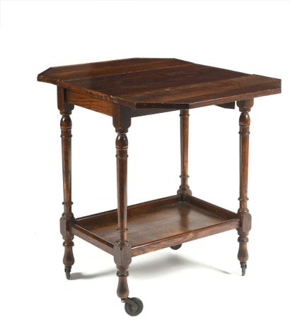 null Servant table on wheels in natural wood and molded with two trays. 

The upper...