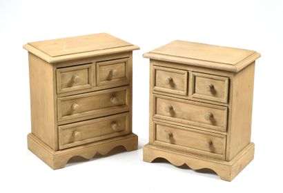 null Pair of bedside tables in pine wood opening with four drawers on three rows....