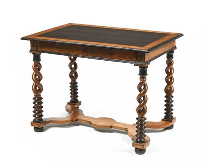 null Table desk in fruitwood and blackened with nets, the twisted and molded base...