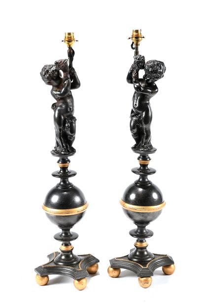 Pair of lamps in black patinated metal and...